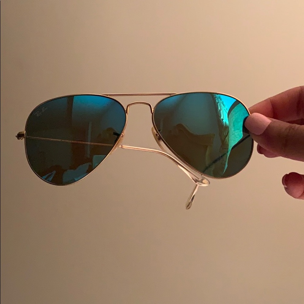 Reflective blue Rayban aviators